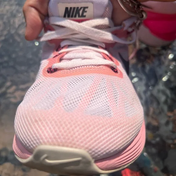 Nike Women's Pink, White and Black athletic sneakers. - Picture 12 of 17